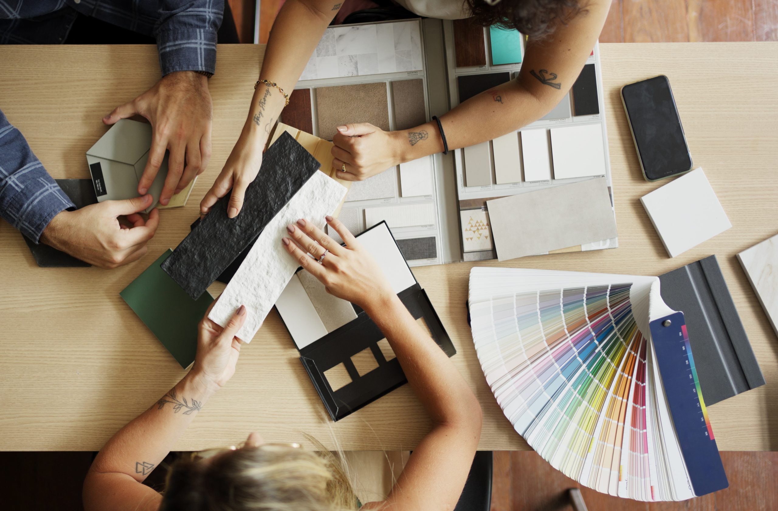 A Revive Remodels interior designer discusses color and texture for a new bathroom style with two homeowners.