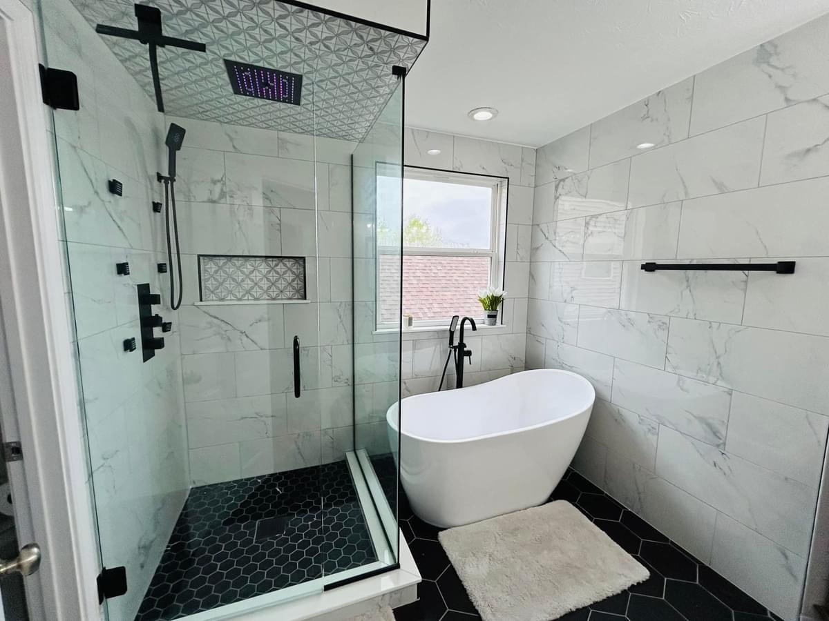 A walk-in shower next to a stand-alone tub provides the best of both worlds in modern bathroom luxury.